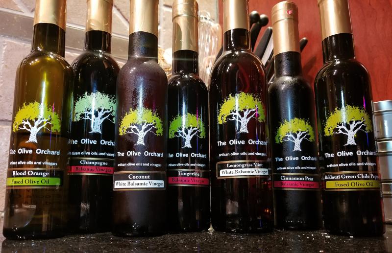Flavored olive oils and vinegars from Olive Orchard Tasting Room can be a secret ingredient, marinade or drizzle for your next dinner party. BOB YESBEK PHOTOS